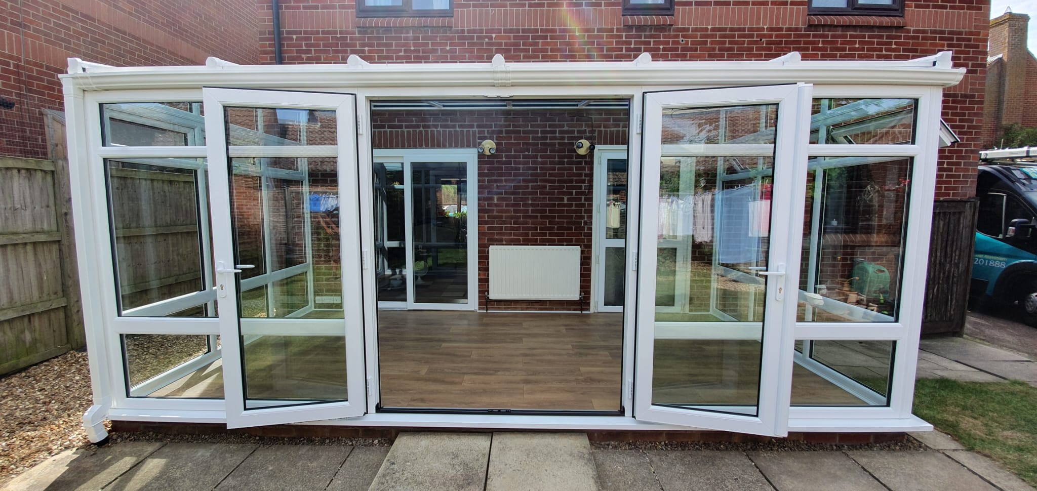 White uPVC conservatory with French doors and glazed sides