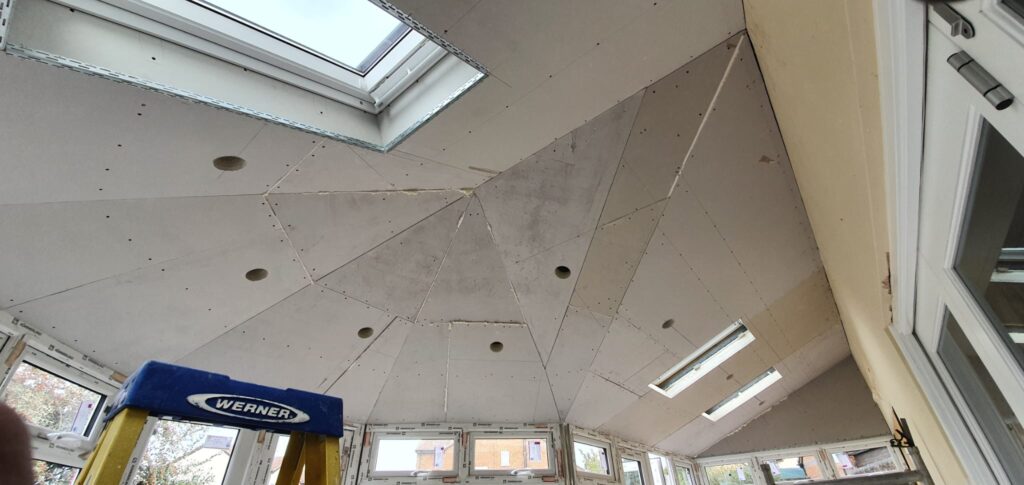 Interior plastered conservatory ceiling with downlights